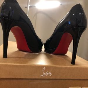 Christian Louboutin black paten shoes